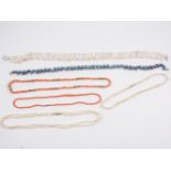 A collection of coral, freshwater pearl and stained pearl necklaces,