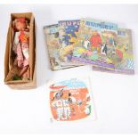 A boxed Pelham Puppet, five Rupert Annuals and a boxed train set, a single 45rpm record.