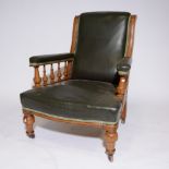 Victorian oak club armchair, scrolled back, the arms with turned spindle sides, turned legs,