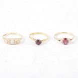 Three gem set dress rings,