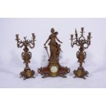 19th Century French mantel garniture, variegated marble and bronzed spelter, comprising a clock,