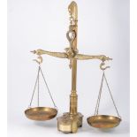 Set of brass scales, Victorian style, the balance cast as snakes, plinth inset with weights,