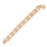 A 9 carat yellow gold modern five gate link bracelet, 15mm wide,