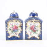 A pair of 19th Century Worcester tea caddies and lids.
