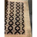 Persian pattern rug, with lozenge medallions on three poles, multiple borders,