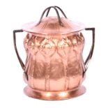 An arts and crafts style copper lidded bin,