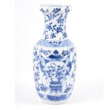 Chinese blue and white vase, body decorated with two figures carrying a vase,