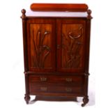 Victorian walnut music cabinet, carved panelled carved doors above drawers,