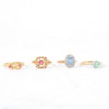 Four pretty gem set rings,