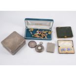 A collection of gilt metal cufflinks, a silver engine turned cigarette/jewel box,