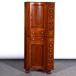 Edwardian mahogany corner cupboard, fitted with doors and drawers, height 119cm.