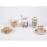 Royal Winton chintz teaware in the "Sweet Pea" design, six cups, five saucers, milk and sugar,
