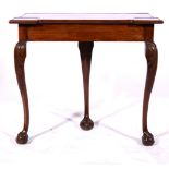 Mahogany console table, adapted from a card table, carved cabriole legs with ball and claw feet,