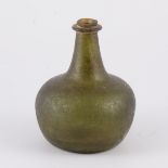 Old glass onion-type bottle,