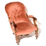 Victorian mahogany framed armchair, hoop back, carved and scrolled arms, serpentine seat,