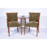 Pair of contemporary oak elbow chairs, upholstered backs and seats, carved and velvet, 64cm.