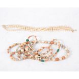 A collection of vintage and modern jewellery, simulated pearl necklaces,