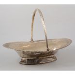 An oval silver bread basket, bead edge border with vertically pierced sides,
