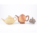 Chinese redware teapot, designed as a peach, branch handle and spout,