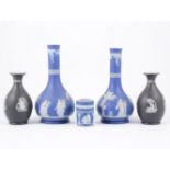 Pair of Wedgwood blue Jasper ware bottle vases, decorated with classical figures, 19.