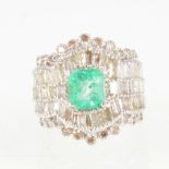 An emerald and diamond fancy dress ring,