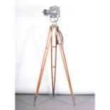 A Strand Electric theatre spot light, on tripod adjustable stand, chrome, brass and steel mounts,