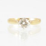 A diamond solitaire ring,