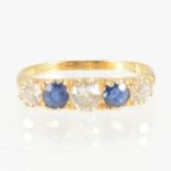 A sapphire and diamond half hoop ring,