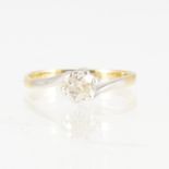 A diamond solitaire ring,