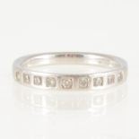 A diamond half eternity ring,