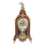 French Transitional style tortoiseshell and gilt metal mantel clock, circa.