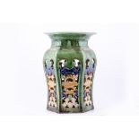 Chinese lead glazed stoneware garden seat, circular top, of shouldered hexagonal form,