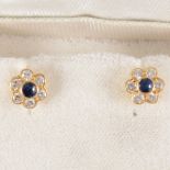 A pair of sapphire and diamond circular cluster earstuds,