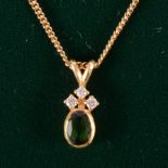 Tom Payne - A tourmaline and diamond pendant and chain,