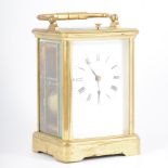French brass cased repeating carriage clock, white enamel dial with Roman numerals,