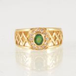 An emerald and diamond dress ring,