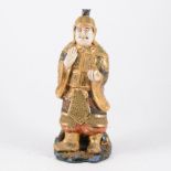 Japanese Satsuma pottery figure, early 20th Century, modelled as a warrior standing, 33cm.