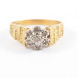 A 1970's diamond cluster ring,