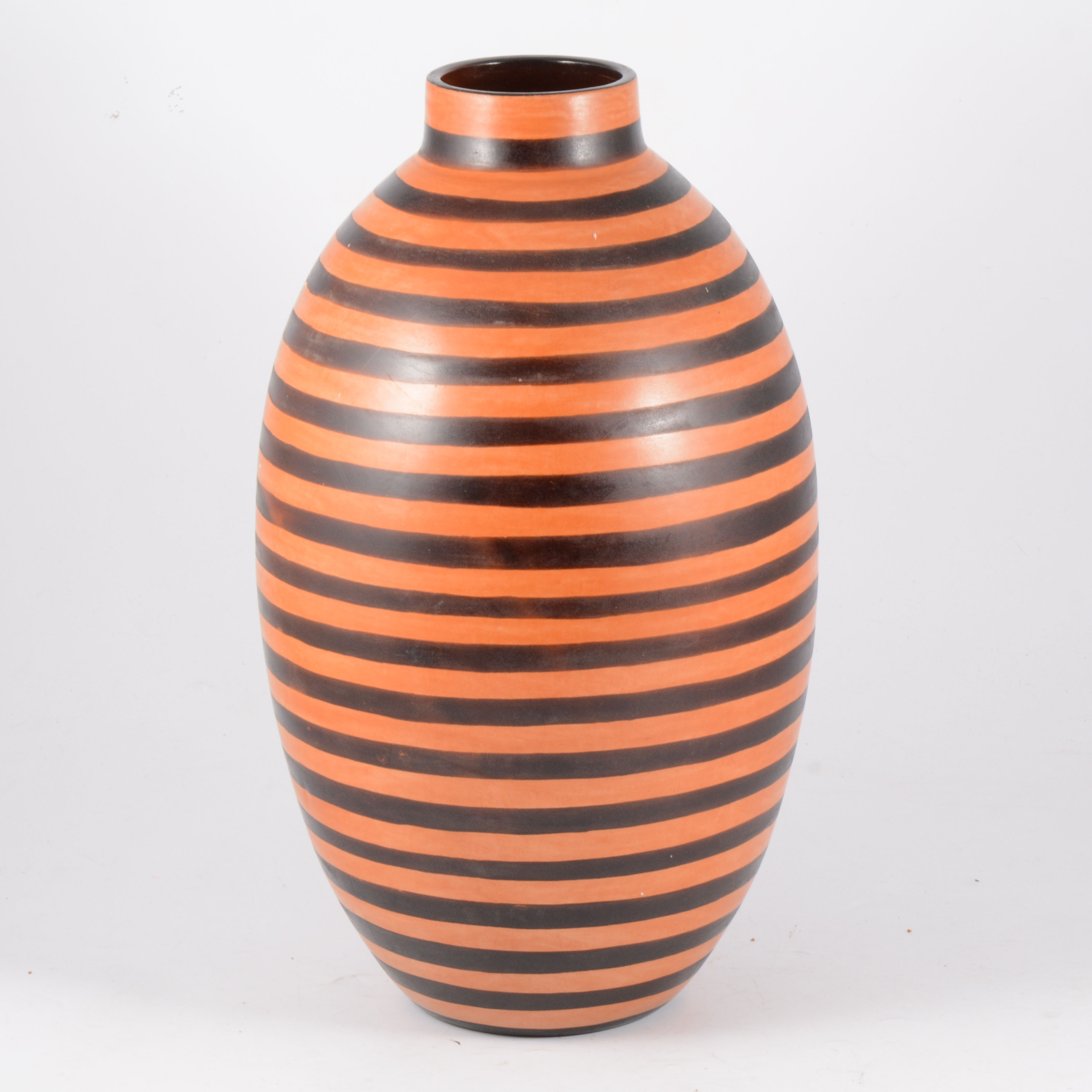 Continental pottery ovoid vase, painted concentric bands, indistinctly inscribed, 39cm.
