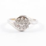A boat shape diamond cluster ring,
