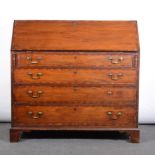 Large George III mahogany bureau, fall front above four long graduating drawers,