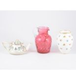 Victorian cranberry glass jug, dimple moulded,