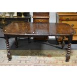 Oak dining table, oval top with one extra leaf, moulded edge, barleytwist legs,