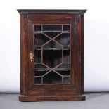 Victorian stained mahogany hanging corner cupboard, dentil cornice,