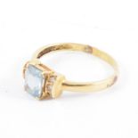 A synthetic blue and white spinel dress ring, the rectangular blue spinel 8mm x 5.