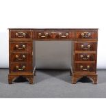 George III style mahogany desk, rectangular top with a leather inset,