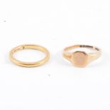Two gold rings, a 22 carat yellow gold wedding band, plain polished 2mm wide D shape,