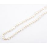A cultured pearl necklace, sixty-four 6.