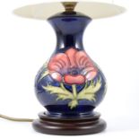A Moorcroft table lamp, "Anenome" pattern on...