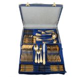 Canteen of gold-plated cutlery in a blue...